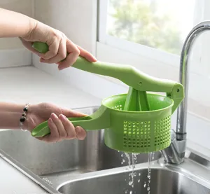 Exprimidor manual de verduras cocina plastico verde herramienta de deshidratacion hogar.