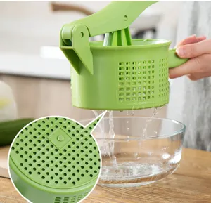 Prensador manual de verduras para cocina, exprimidor deshidratador de plástico.