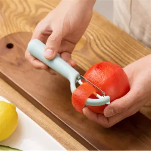 Éplucheur de fruits et légumes multifonctionnel domestique avec poignée ergonomique