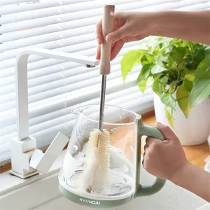 Long handle wooden cup brush for cleaning glass bottles, cups and kitchen teapots.