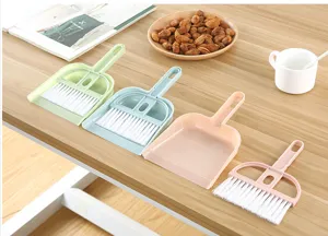 Mini desktop broom dustpan set detail, practical cleaning tool for table keyboard and car use.