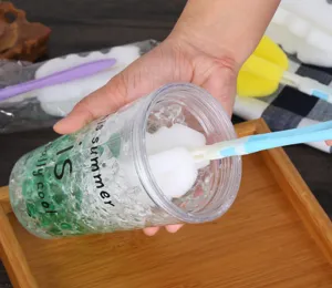 Foldable sponge cup brush for cleaning baby bottles and thermoses, convenient household tool.