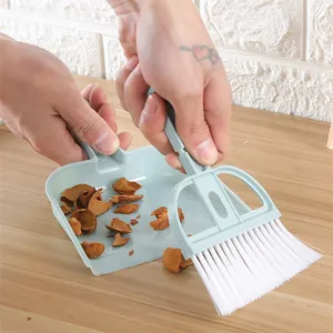 Mini desktop broom and dustpan set for table cleaning, small sweeping brush tool.