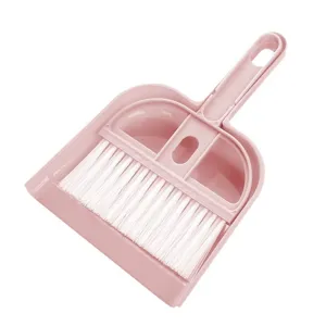 Mini desktop dustpan and broom set, compact pink cleaning tool for table, car and keyboard.