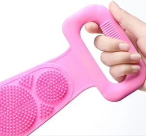 Silicone back scrubber close up showing textured massage bristles and pink handle detail.