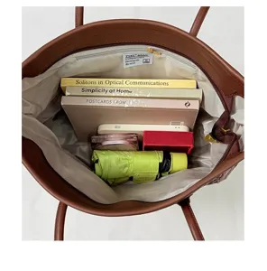 Brown PU leather woven tote bag with large capacity, ideal for daily commute and casual style.