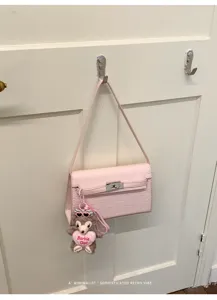 Pink crocodile pattern shoulder bag detail, elegant retro style mini handbag with cute bear.