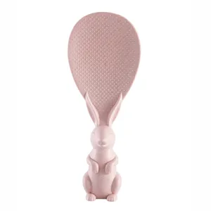 Cute standing rabbit rice paddle, non-stick pink rice spoon kitchen tool for daily cooking.