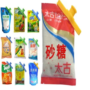 Plastic food sealing clip with pouring spout for kitchen snack and seasoning bag storage.