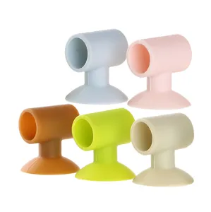 Detailed view of colorful silicone suction door stoppers, multi-color wall protectors.