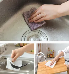 Gros plan détaillé sur le chiffon de nettoyage de cuisine montrant l'absorption d'huile.