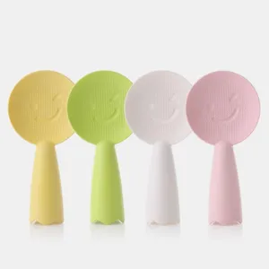Cuchara de arroz de pie antiadherente creativa cocina juego cuatro colores vivos.