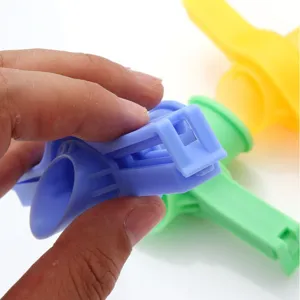 Plastic food sealing clip with pour spout, moisture-proof kitchen snack bag storage clamp.