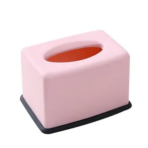 Modern pink plastic tissue box with dark base, cute desktop napkin holder for home use.