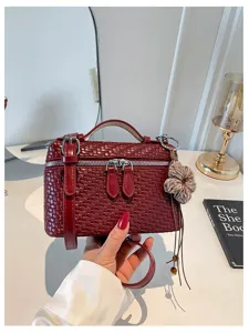 Vintage woven vanity bag for women, stylish top handle shoulder crossbody bag for daily commute.