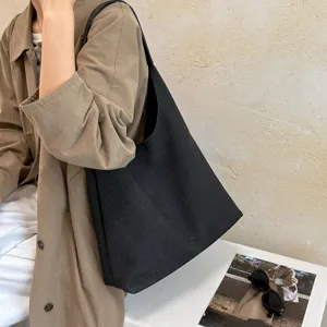 Borsa tote in pelle intrecciata nera da donna, borsa a spalla elegante e capiente.