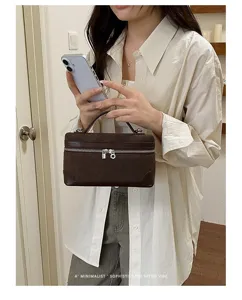 Retro suede lunch box handbag for women, casual minimalist top handle shoulder bag.