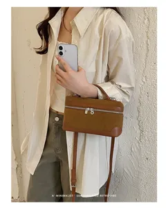 Retro suede vanity crossbody bag for women, minimalist chic shoulder bag with top handle.