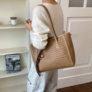 Minimalist woven tote bag for women, large capacity stylish shoulder bag for daily commute.