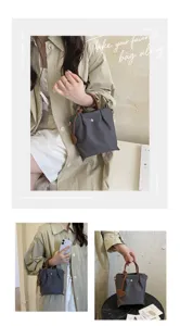 Vue détaillée du sac cabas seau en nylon pour femmes avec poignée en cuir marron et charm cœur.