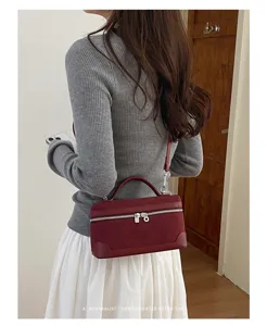 Minimalist retro suede vanity shoulder bag for women, elegant vintage top handle crossbody bag.