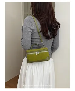 Retro suede vanity shoulder bag with top handle and zipper closure for women daily chic style.