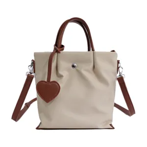 Sac cabas en nylon pour femme style coréen, sac seau tendance avec pendentif cœur, bandoulière.