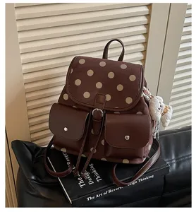 Korean niche polka dot backpack for women, chic brown suede retro daily casual school bag.