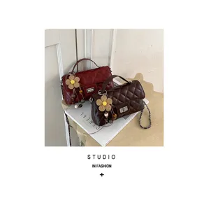 Quilted chain shoulder bag for women, chic crossbody square bag with cute flower pendant.
