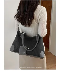 Modische retro vertikale Streifen Boston Tasche Damen große Kapazität Schultertasche.