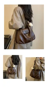 Borsa a zaino monospalla da donna in pelle marrone rétro grande capacità per uso quotidiano.