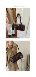 Detailed view of the stylish woven boston shoulder bag, perfect for everyday fashion use.