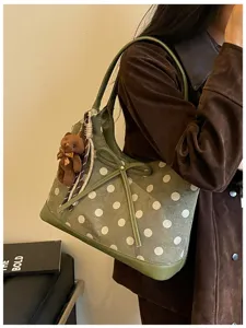 Korean fashion polka dot shoulder underarm bag, stylish women commute handbag with bow charm.