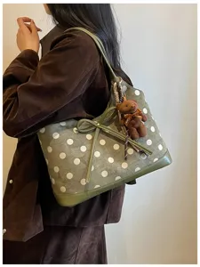 Korean style polka dot shoulder bag with cute bow and bear pendant, commuter tote purse.