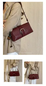 French niche woven baguette shoulder bag for women, retro casual commuter handbag.