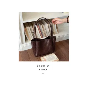 Vintage woven tote bag for women stylish large capacity shoulder handbag commuting daily.