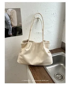 Sac cabas souple rétro minimaliste pour femme, grand sac porté épaule très élégant.