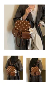 Brown polka dot backpack for women, stylish daily commuter school bag with cute dog pendant.