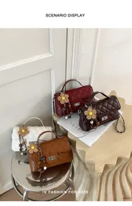 Quilted chain shoulder bag for women, stylish crossbody square bag with cute flower charm.