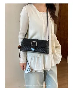 Black woven shoulder bag, elegant retro baguette bag for women, chic daily commute handbag.