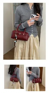 Chic women's Boston shoulder bag, stylish retro handbag with chic beaded charm detail.