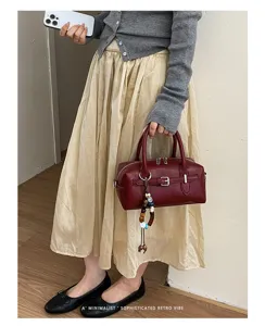 Stylish women's vintage Boston handbag, premium pillow shoulder bag for daily commuting.