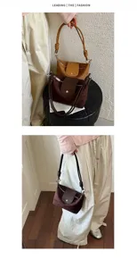 Vintage Wildleder Umhängetasche mit Knotengriff und Klappentasche, stylische Beuteltasche.