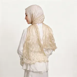 Shiny crinkled tulle long scarf detail showing soft breathable fabric and delicate lettuce edge design.