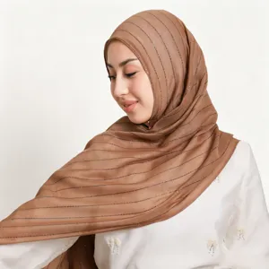 Lightweight striped sequin hijab and scarf detail view, showing delicate texture and shimmer.