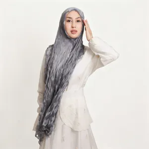 Grey crinkled hijab chiffon scarf for women, lightweight breathable solid color long wrap.