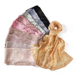 Detailed view of women's sequin embroidered floral lace scarf in multiple vibrant colors.