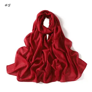 Red striped metallic thread scarf detail view, lightweight fabric, versatile daily accessory.