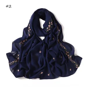 Navy blue chiffon scarf with pink floral and bow embroidery. Lightweight neck wrap for women.