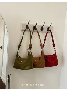 Modische Vintage Umhängetasche Knödel Tasche mit einzigartigem Knotengriff und Metallring.